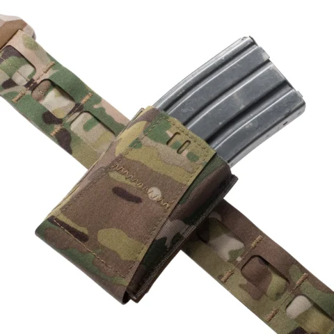 Rifle magazine pouch mounted on a first-line battle belt, showing elastic retention and secure fit during movement