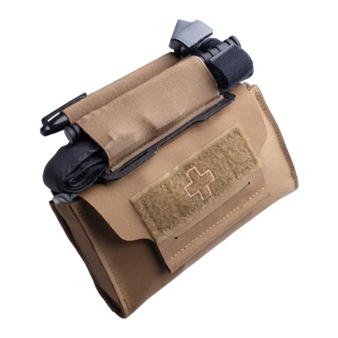 Compact medical pouch mounted on a first-line battle belt, designed for secure carry and rapid access to lifesaving equipment
